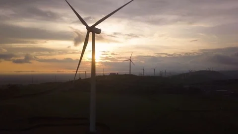 Drone Ascending Facing Windmills at Sunset in Costa Rica in 4K Video stock 93872632