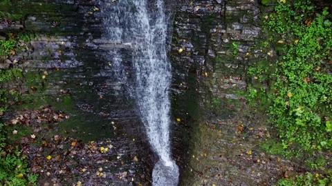 Drone Ascending with a Fixed Angle over Bursuc Waterfall Putna Slow Motion Stock Footage 288720149