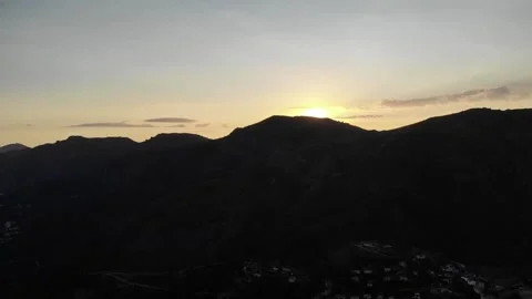 Drone Ascending Over Corsican Mountains Revealing Sun Stock Footage 331662010