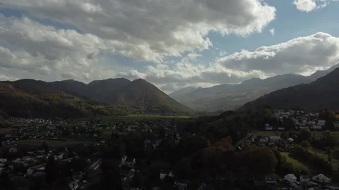 Drone Ascending Over Mountains with Dramatic Light and Shadow in France Video stock 331661653