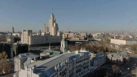 Drone ascending over riverside skyline with historic towers Video stock 322132402