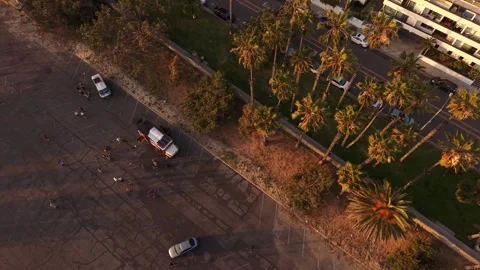 Drone Ascending Over Santa Monica Parking Lot and Palm Trees Stock-Footage 332326537