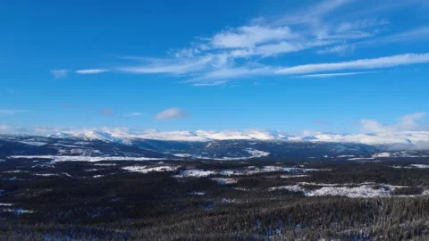 Drone ascending over snowy pine forest in Norway winter 4K Video stock 328990799