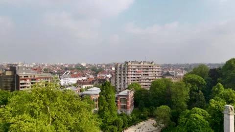 Drone Ascending &amp; Panning South over Parc Leopold, Brussels at Sunset Stockbeeldmateriaal 276098934