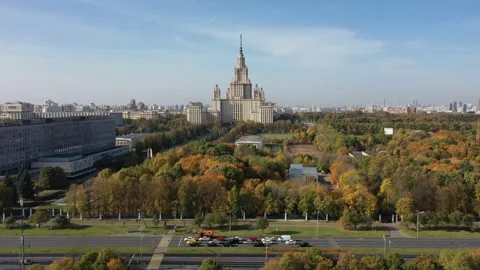 Drone ascending vertically with Moscow State University in background Stock Footage 325045618