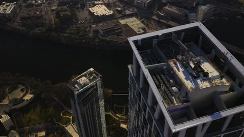 Drone Ascending Waterline Tower Construction in Downtown Austin Before Sunset Video stock 327764674
