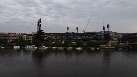 Drone Ascends to Reveal Baseball Stadium in downtown Pittsburgh at sunrise Stock Footage 341700468