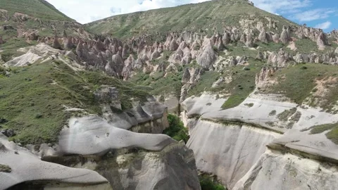 Drone Ascent From Base to Summit Over Tuff Rock Formations 스톡 동영상 336489760