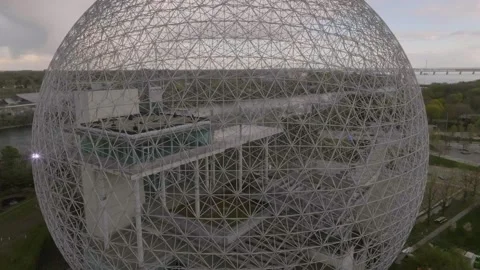 Drone asending exposing biosphere in parc jean drapeau quebec canada icon of Stock Footage 342117540