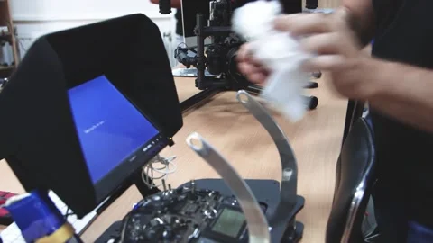 Drone Assembling Quad Copter Preparation for Flight Stock Footage 142137180