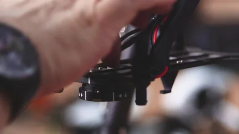 Drone Assembling Quad Copter Preparation for Flight Stock Footage 142137202