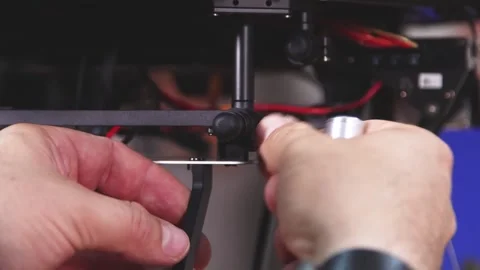 Drone Assembling Quad Copter Preparation for Flight Stock Footage 142137203