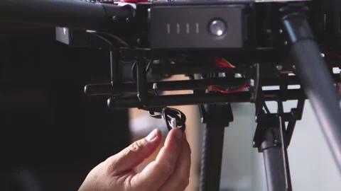 Drone Assembling Quad Copter Preparation for Flight Stock Footage 142137223