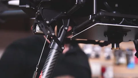 Drone Assembling Quad Copter Preparation for Flight Stock Footage 142137245