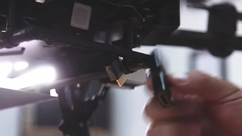 Drone Assembling Quad Copter Preparation for Flight Stock Footage 142137276
