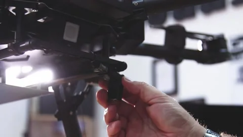 Drone Assembling Quad Copter Preparation for Flight Stock Footage 142137278