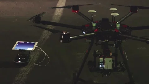 Drone Assembling Quad Copter Preparation for Flight Stock Footage 142137349