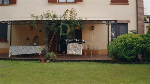 A drone with augmented reality holograms is making a parcel delivery. Stock Footage 114927188