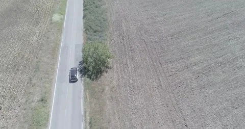 Drone auto tracking car 2 Stock Footage 182792694