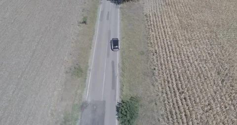 Drone auto tracking car Stock Footage 182797918