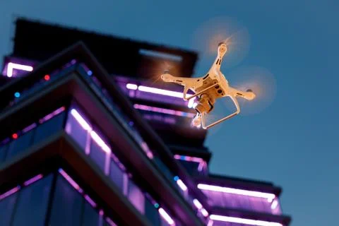 Drone on the background of the building. Stock Photos