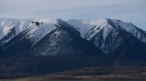 Drone on a background of mountain peaks Stock Footage 67287117