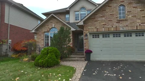 Drone backing up from real estate listing Stock Footage 229562398