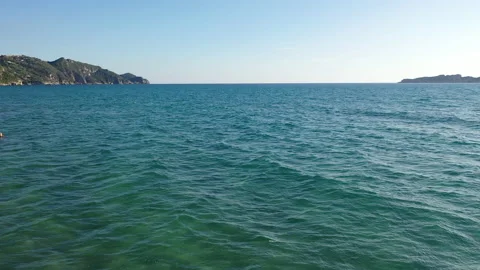 Drone Backwards Flight Low Altitude over Ocean 스톡 동영상 230184310