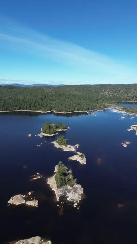 Drone backwards flight.over small islands, summer feeling. Stock-Footage 319476789