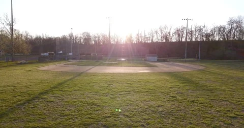 Drone baseball diamond in park at dusk Stock Footage 127054058