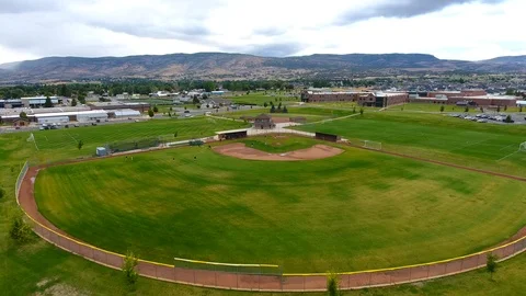 Drone baseball practice outside a highschool Stock-Footage 117821796