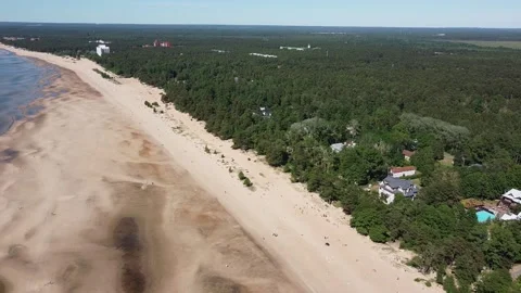 Drone Beach Ebb Russian Villas in the Forest Stock Footage 134284924