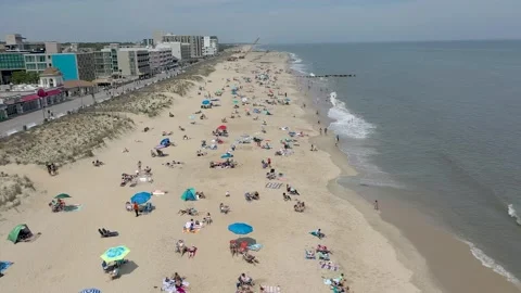 Drone Beach Fly over Summer fun at the Ocean Stock Footage 241114296