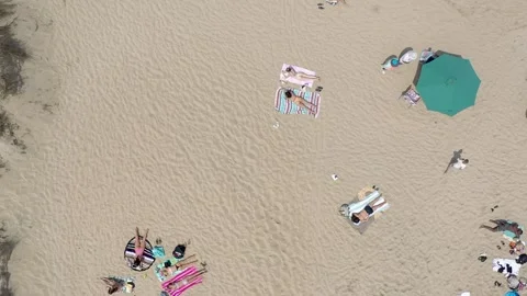 Drone Beach Fly overhead Sunbathing and ... | Stock Video | Pond5