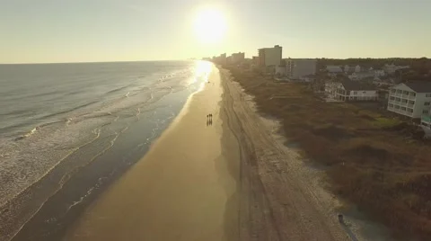 Drone beach flyover in myrtle beach sc with sunset.mp4 Stock Footage 56924537