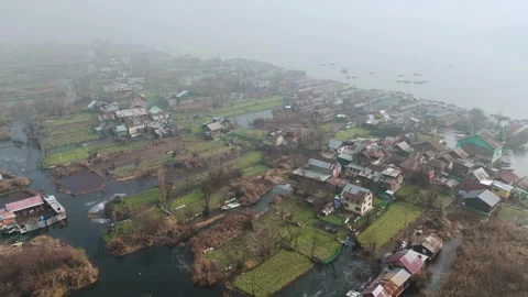 Drone beautifully capturing the winter freeze surrounding Dal's houseboats. Stock Footage 311020831