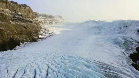 Drone Between Mountains And Over Vatnajokull Glacier Stock Footage 168773641