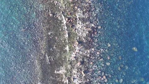 Drone Bird's Eye View of Waves Crashing on Rocks Texture Manazuru Japan Stock Footage 329058585