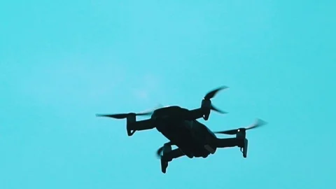Drone in blue BG Stock Footage 90487459