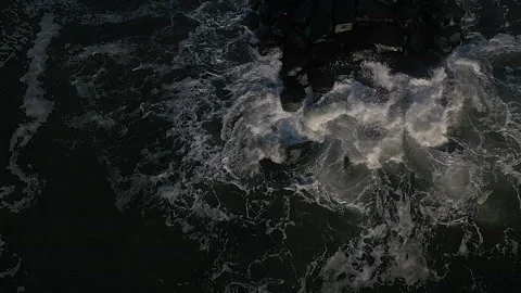 Drone cam down ocean waves rocks 120fps Stock Footage 151540480