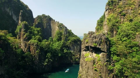 The drone camera across a bay between rocky mountains. Thailand. Stock Footage 63431094