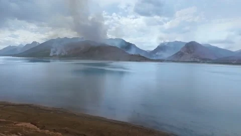 Drone camera captured haze after a wildfire near the Jackson Lake Video stock 138114660