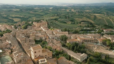 Drone camera captures city panorama. San Gimignano, historic medieval town in Stock Footage 308538533