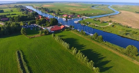 Drone camera flaying over the marina on a countryside on a sunny summer day  - 7 動画素材 92906371