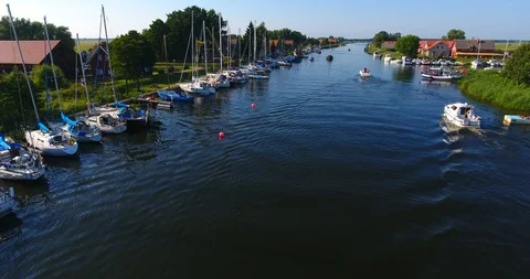 Drone camera flaying over the marina on a countryside on a sunny summer day  - 6 스톡 동영상 92923684