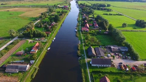 Drone camera flaying over the river on a countryside on a sunny summer day - 13 Stock Footage 74867906