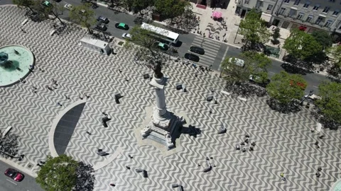 A drone camera flies around the monument to King Pedro IV in Lisbon Stock Footage 202016664