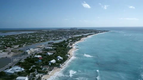 Drone camera flies to coast area of Cockburn Town, Grand Turk, Turks and Caicos Video stock 194506620