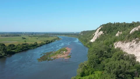 The drone with the camera flies over the trees 스톡 동영상 113695997