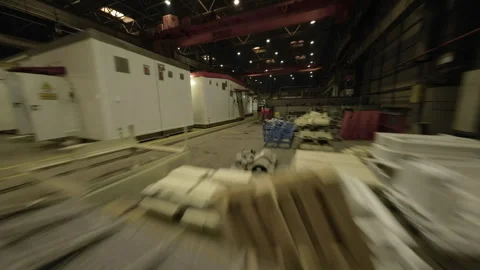 Drone with camera flies through wide factory spaces Stock Footage 303112728